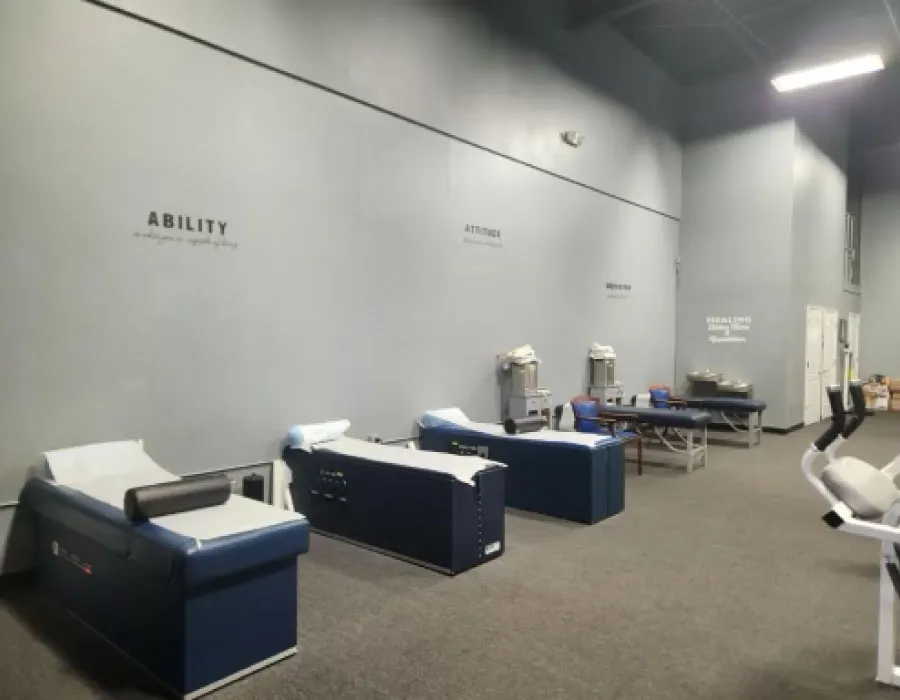 Treatment area with therapy tables at a Doc Tony clinic